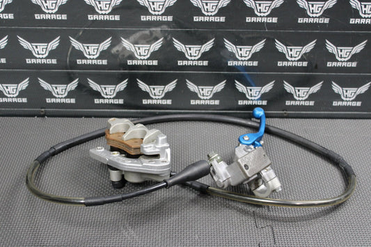 2006 Kawasaki KX450F OEM Nissin Front Brake Caliper Master Cylinder 43015 - 0167 - hggarage