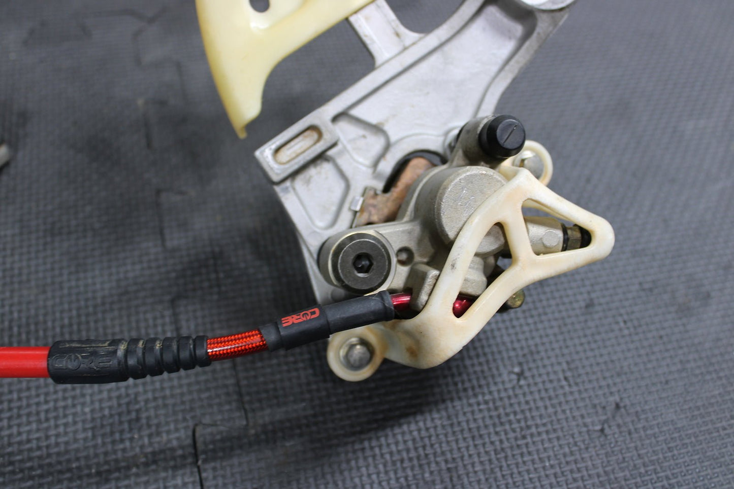 2007 HONDA CR125R CR250R CRF450R OEM REAR BACK BRAKE CALIPER MASTER CYLINDER ASS - hggarage