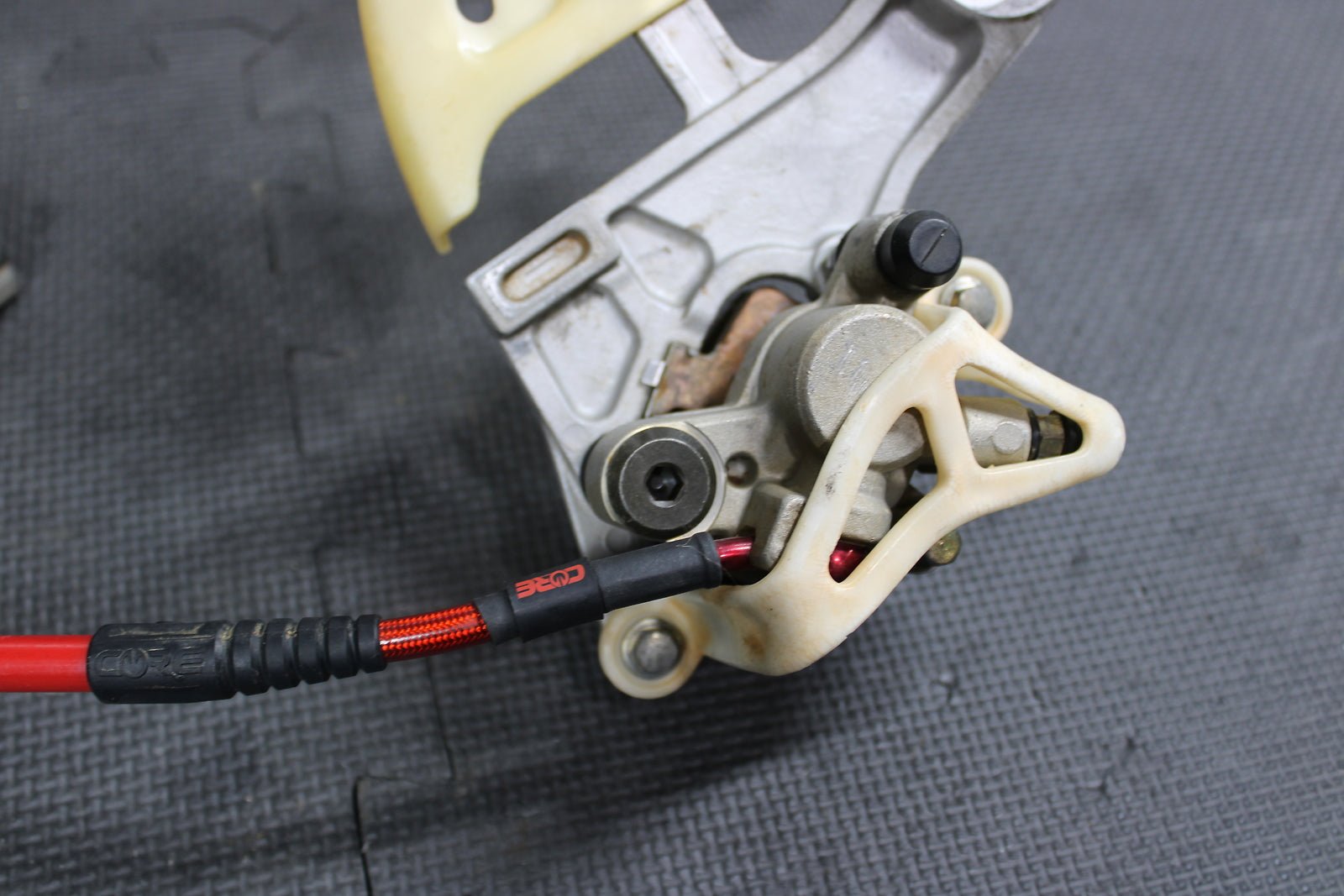2007 HONDA CR125R CR250R CRF450R OEM REAR BACK BRAKE CALIPER MASTER CYLINDER ASS - hggarage