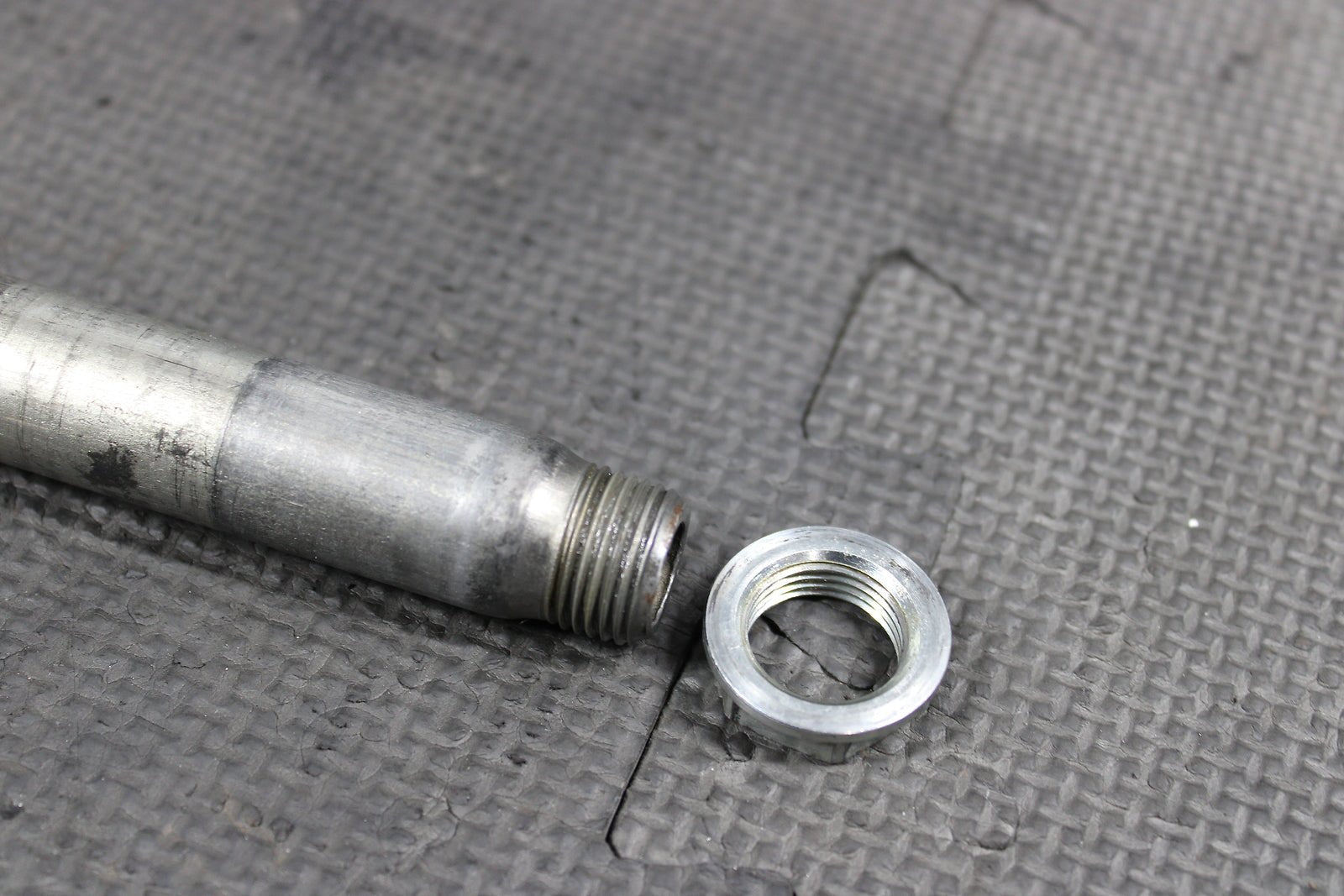 2008 Kawasaki KX250F OEM Front Wheel Rim Axle Pivot Bolt - hggarage
