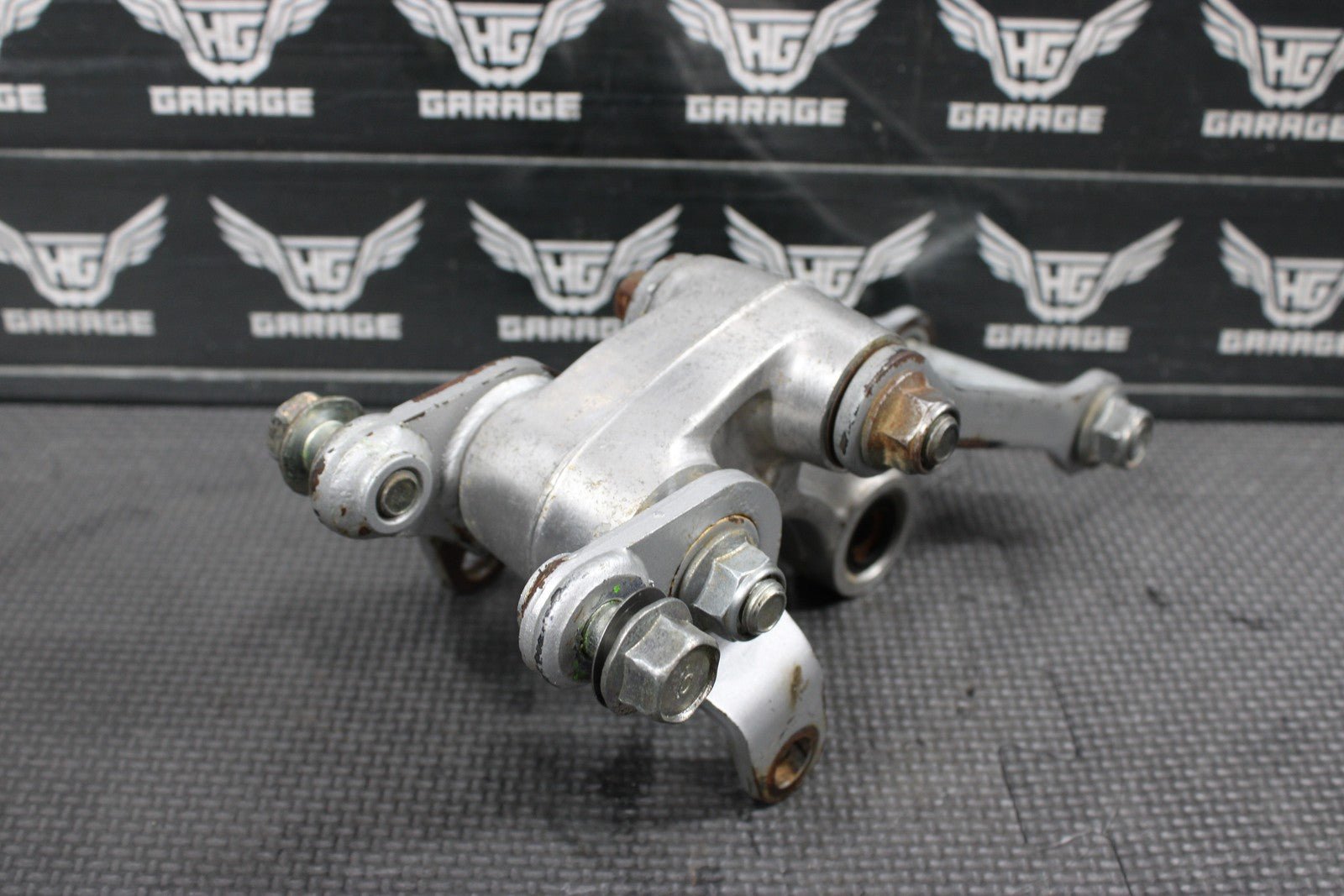 2001 KAWASAKI KX100 OEM REAR SHOCK LINKAGE RELAY ARM 39007 - 1262 - hggarage