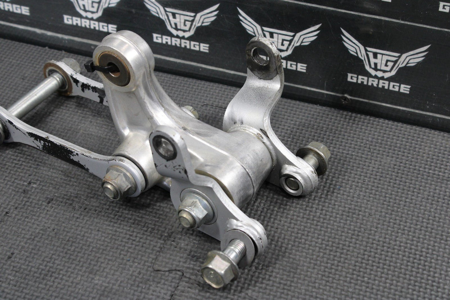 2012 KAWASAKI KX85 OEM REAR SHOCK LINKAGE LINKS RELAY ARM DOGBONE 32037 - 1553 - hggarage