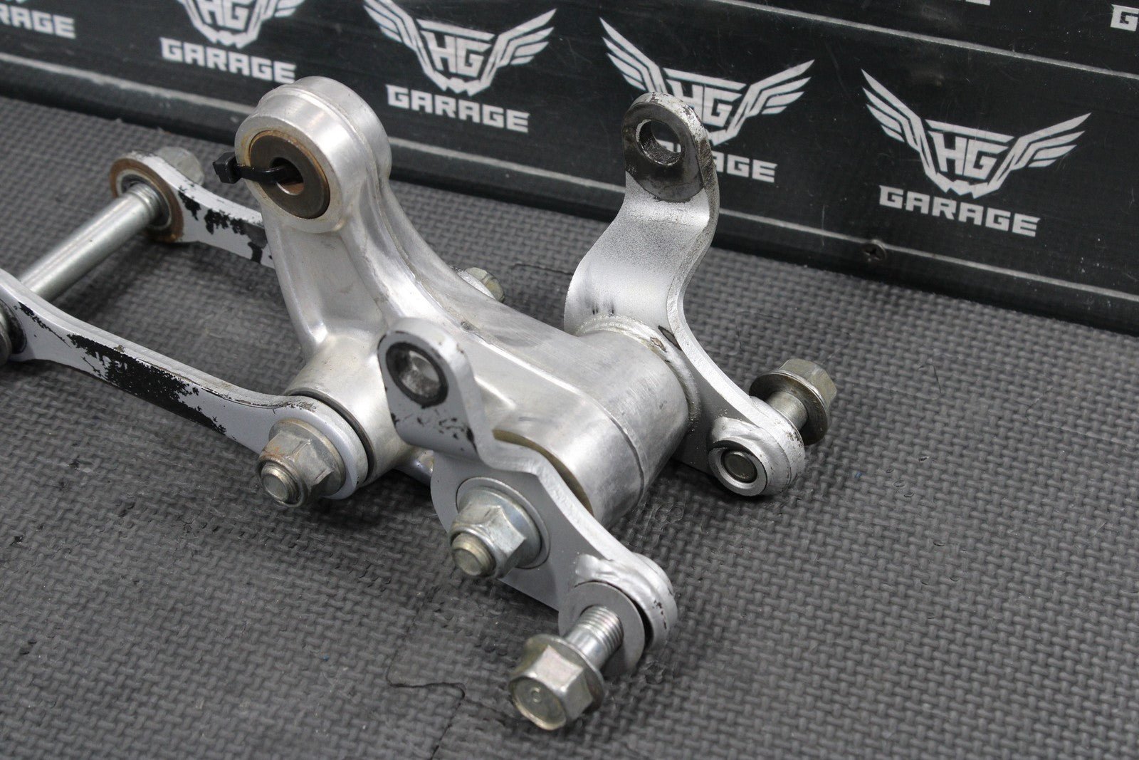 2012 KAWASAKI KX85 OEM REAR SHOCK LINKAGE LINKS RELAY ARM DOGBONE 32037 - 1553 - hggarage