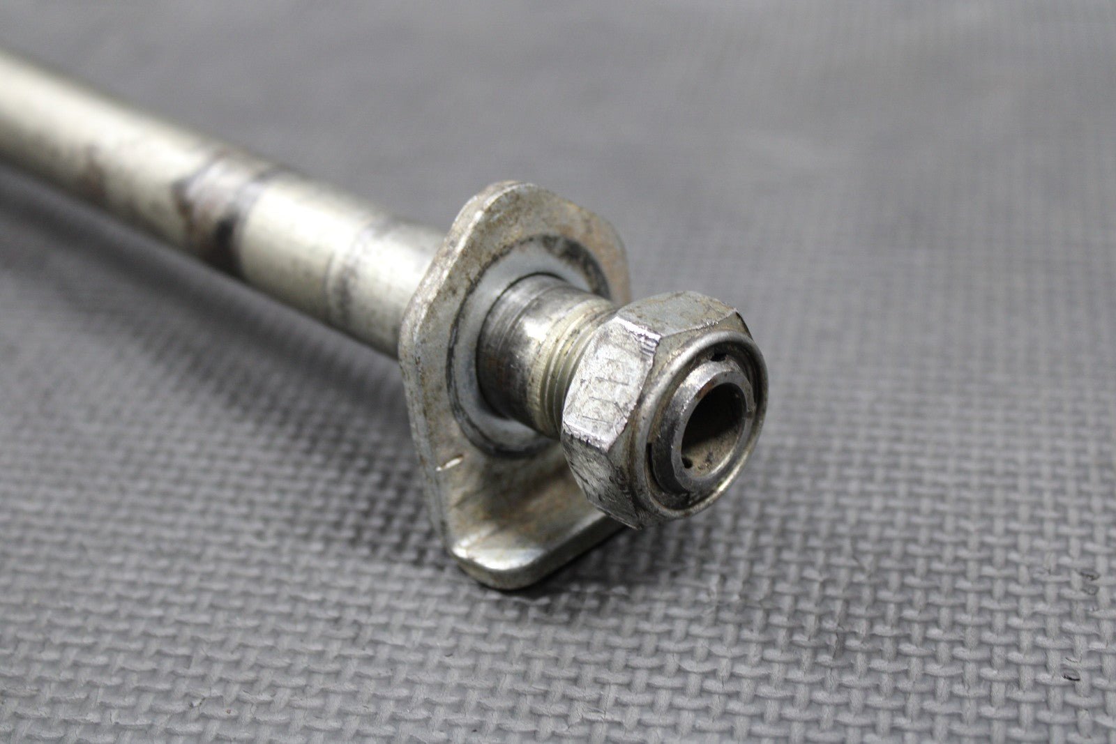 2009 KAWASAKI KLX250SF OEM REAR AXLE BACK WHEEL RIM PIVOT BOLT SHAFT 41068 - 0602 - hggarage