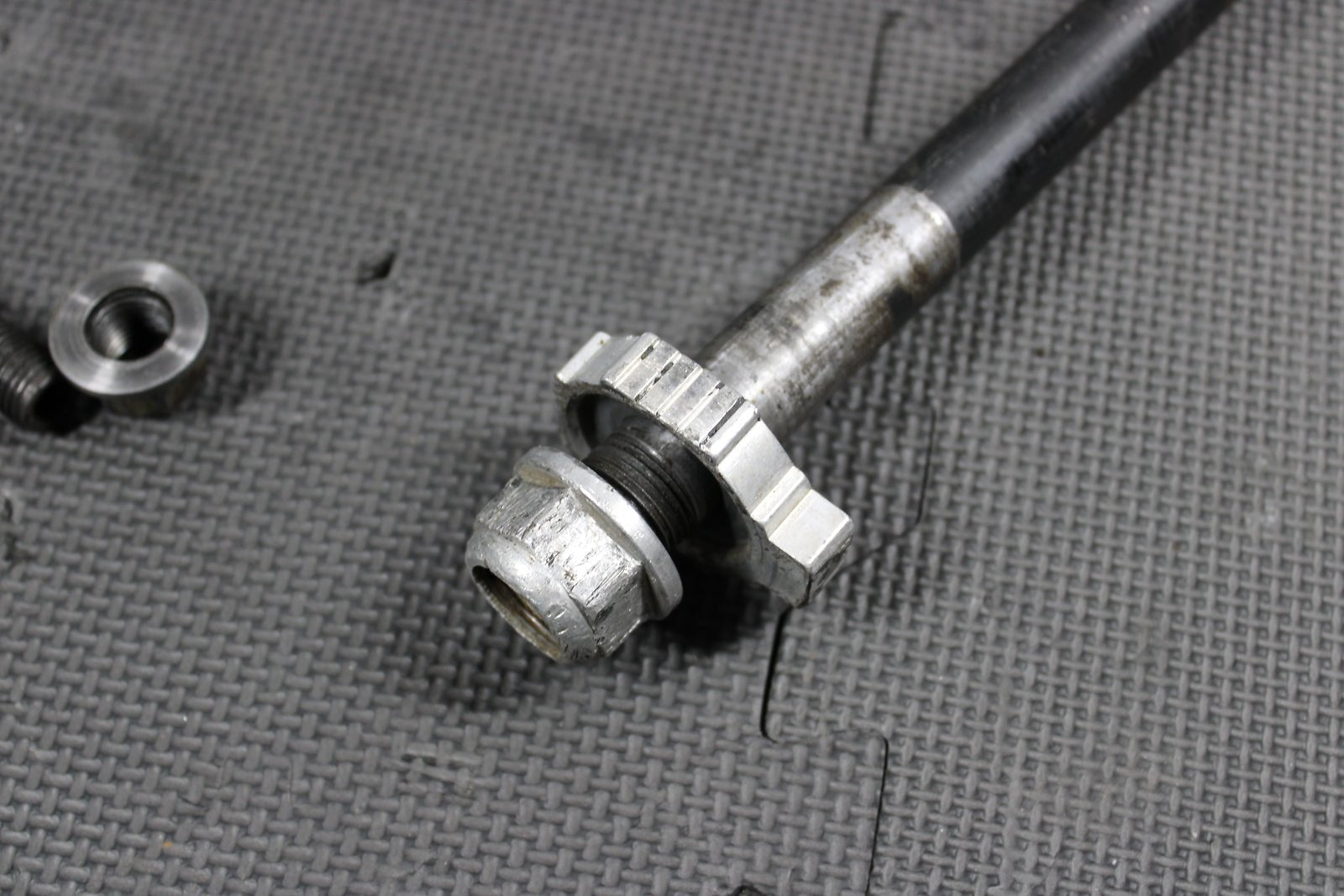 2006 KTM 85SX OEM REAR AXLE BACK WHEEL RIM PIVOT BOLT AXEL - hggarage