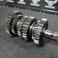 1995 KAWASAKI KX125 OEM ENGINE TRANSMISSION TRANNY ASSEMBLY GEARS 13127 - 1229 - hggarage