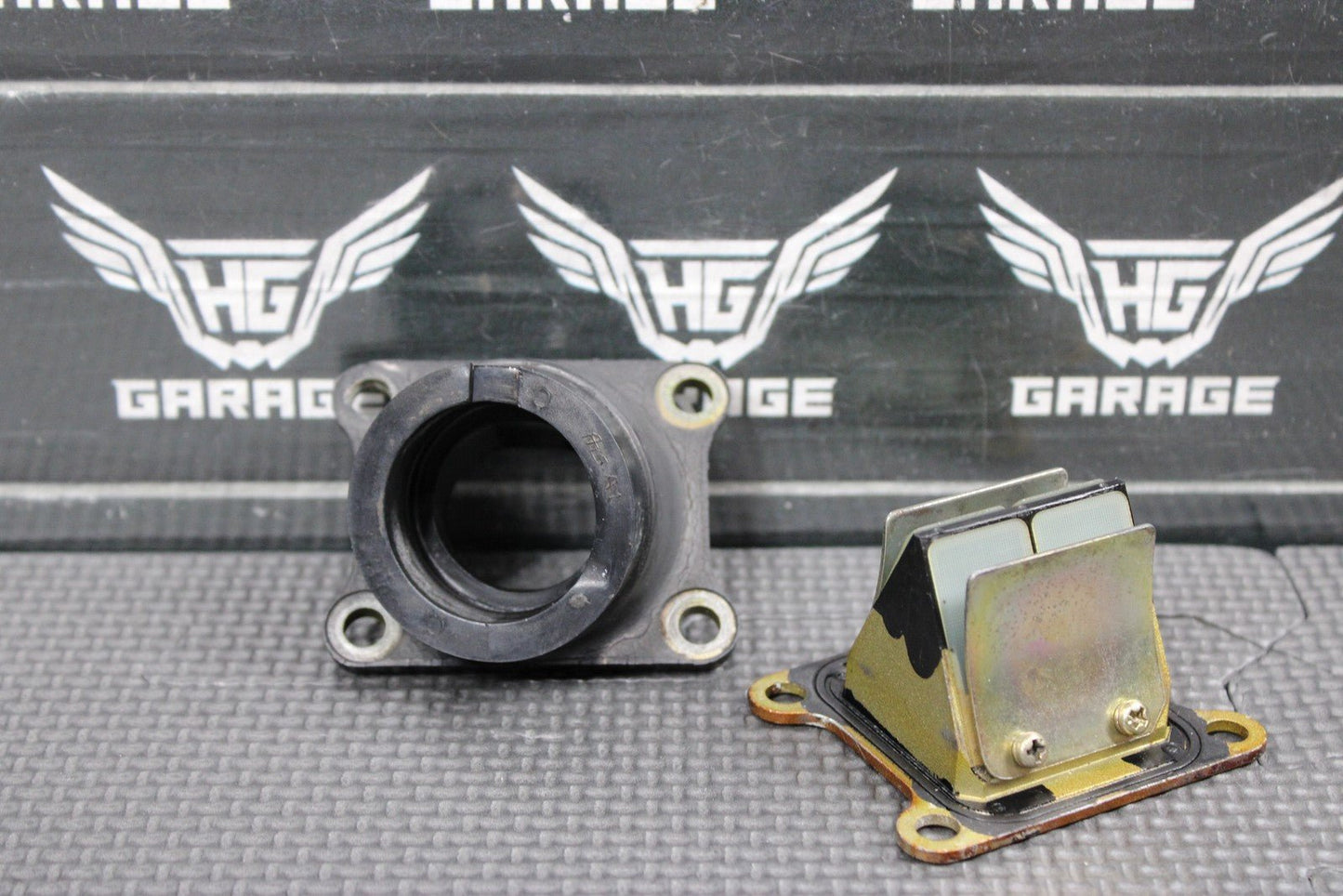 2004 KAWASAKI KX65 00 - 22 OEM INTAKE REED BLOCK ASSEMBLY 12021 - 1015 - hggarage
