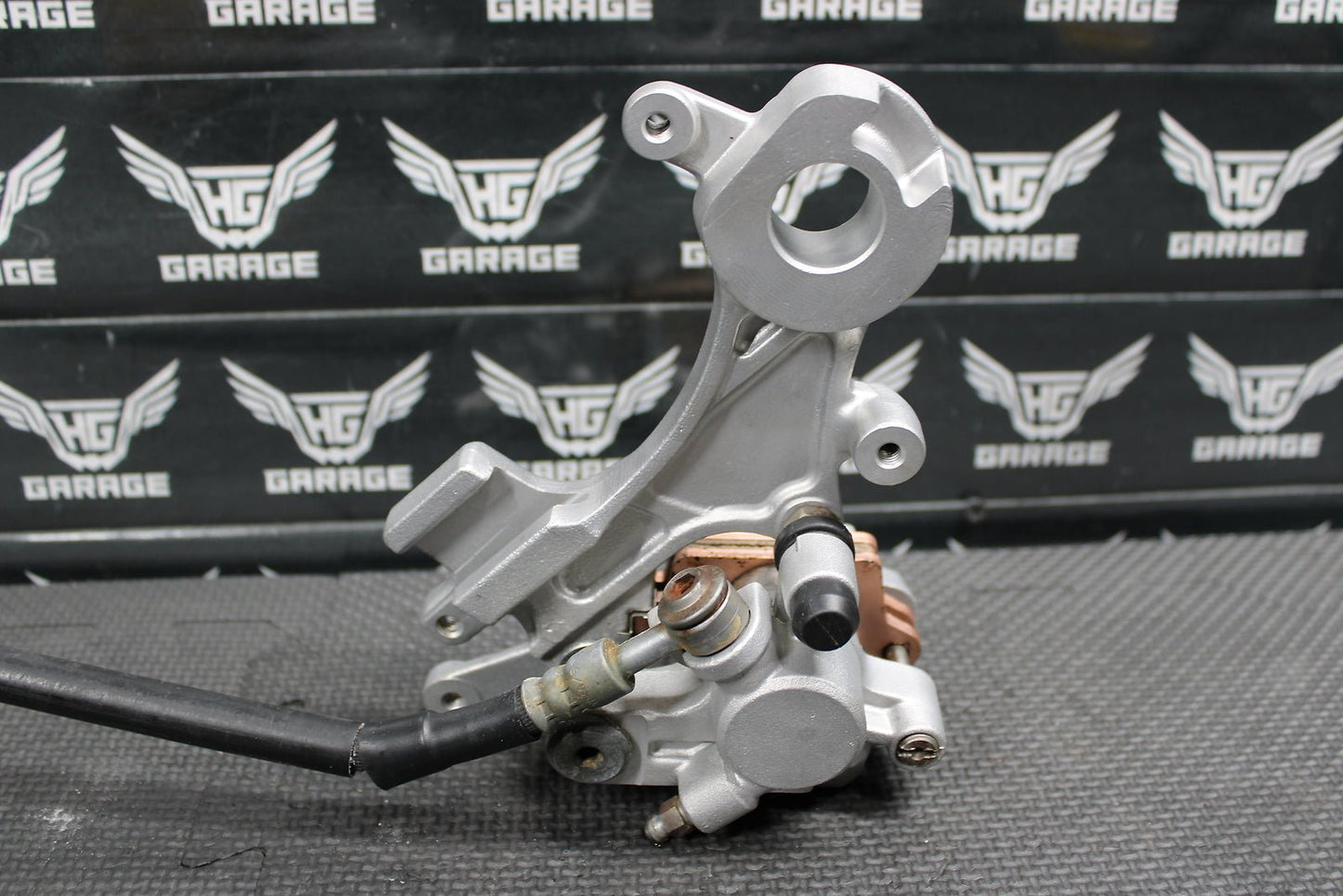 2002 Yamaha YZ426F OEM Nissin Rear Back Brake Caliper Line Bracket Assembly - hggarage