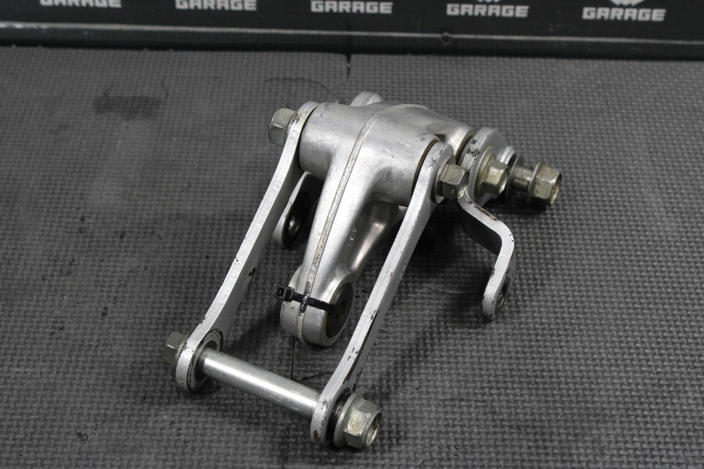 2012 KAWASAKI KX85 OEM REAR SHOCK LINKAGE LINKS RELAY ARM DOGBONE 32037 - 1553 - hggarage