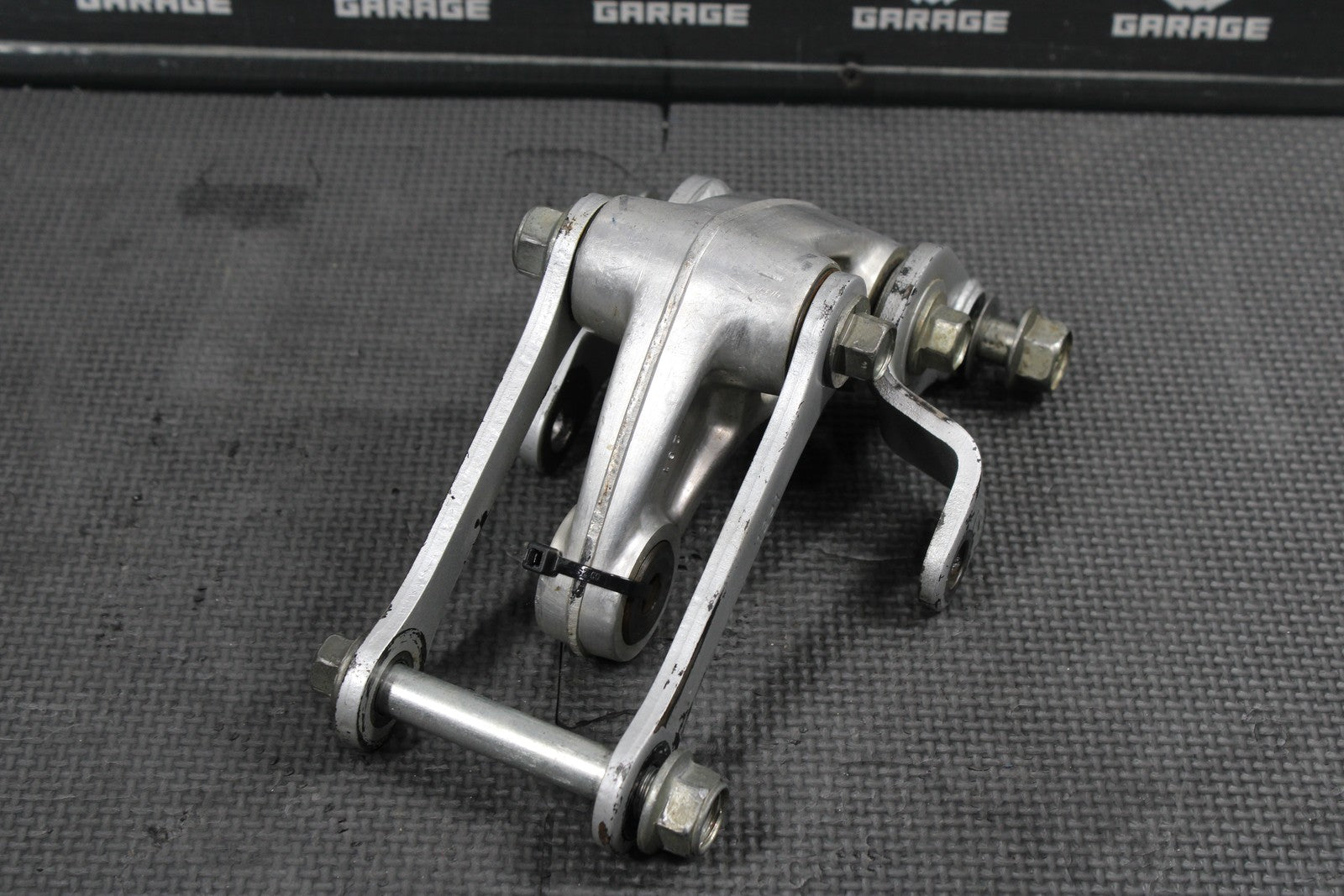 2012 KAWASAKI KX85 OEM REAR SHOCK LINKAGE LINKS RELAY ARM DOGBONE 32037 - 1553 - hggarage