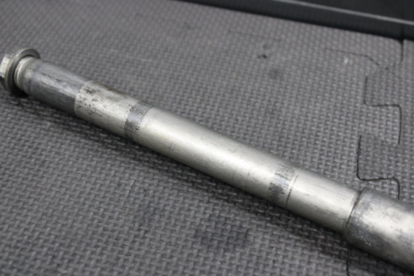 2009 Kawasaki KX250F OEM Front Wheel Rim Axle Pivot Bolt - hggarage