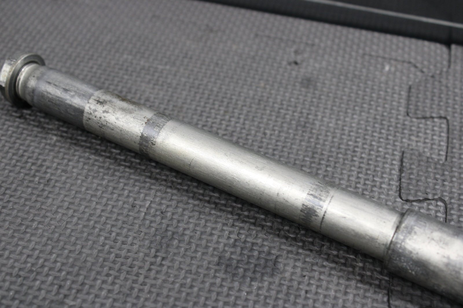 2009 Kawasaki KX250F OEM Front Wheel Rim Axle Pivot Bolt - hggarage