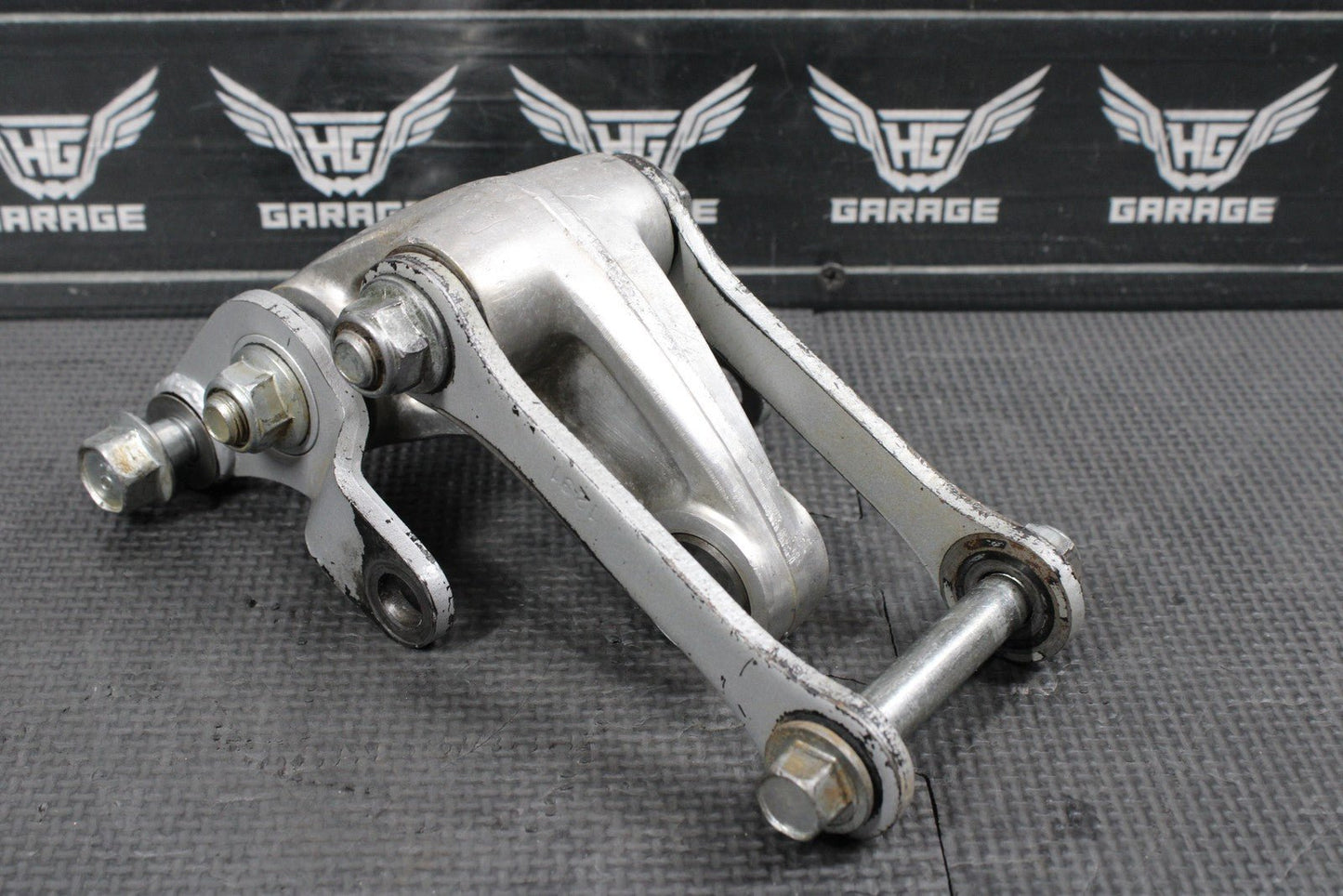 2014 KAWASAKI KX100 OEM REAR SHOCK LINKAGE RELAY ARM DOGBONE ASSEMBLY - hggarage