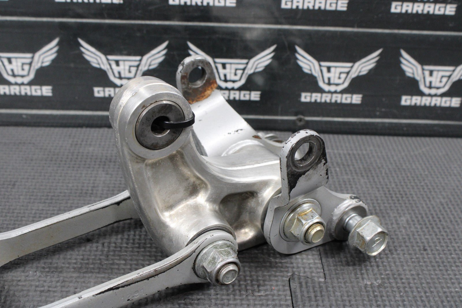 2014 KAWASAKI KX100 OEM REAR SHOCK LINKAGE RELAY ARM DOGBONE ASSEMBLY - hggarage