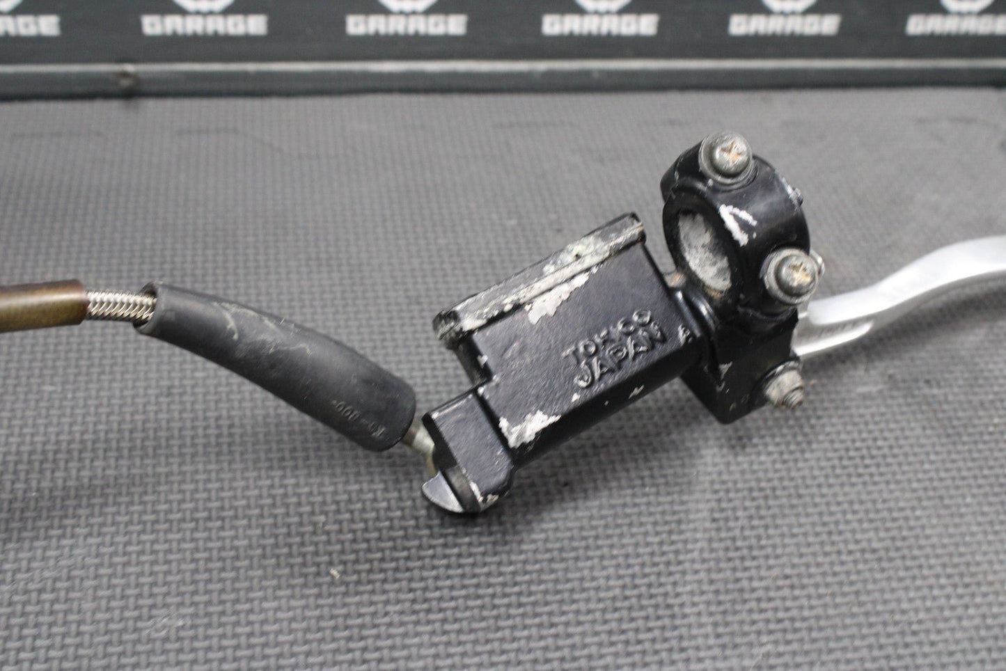 1986 KAWASAKI KDX200 OEM TOKICO FRONT BRAKE CALIPER MASTER CYLINDER ASSEMBLY - hggarage