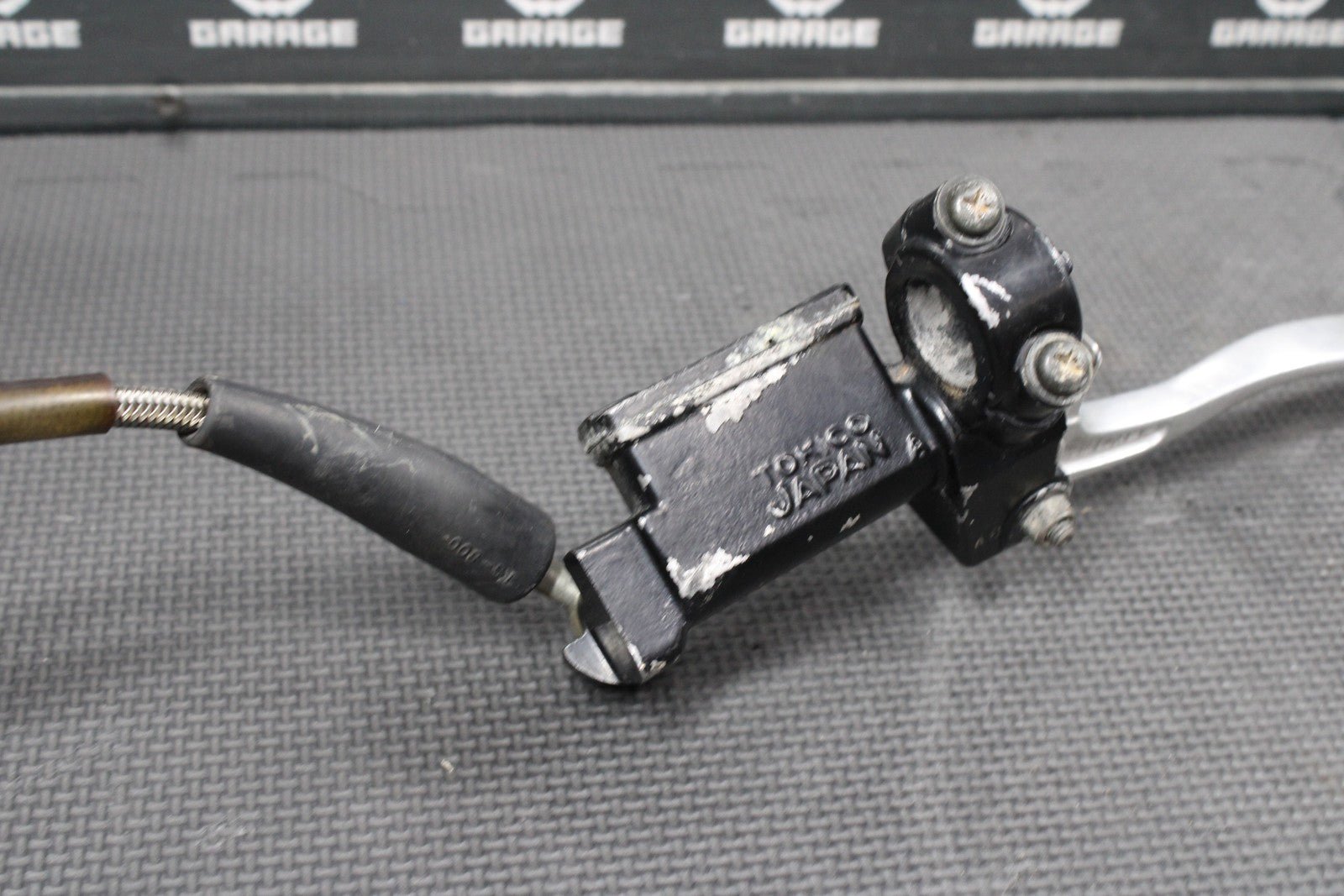 1986 KAWASAKI KDX200 OEM TOKICO FRONT BRAKE CALIPER MASTER CYLINDER ASSEMBLY - hggarage