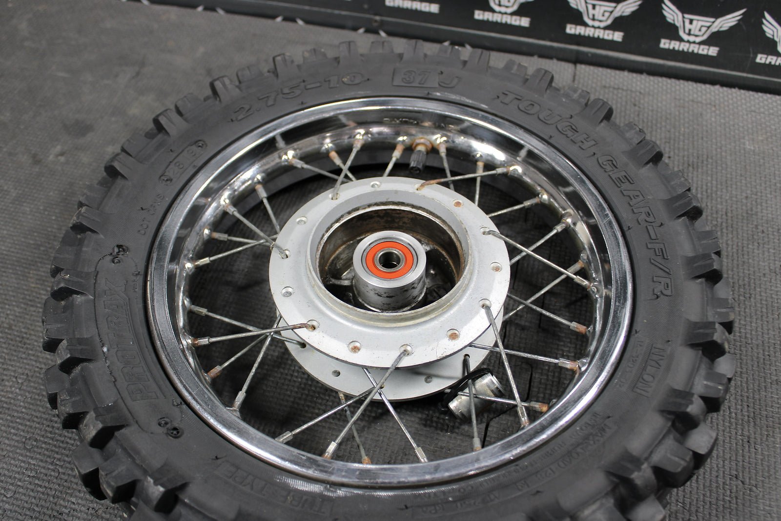 2000 HONDA 00 - 03 XR50R OEM FRONT WHEEL RIM HUB ASSEMBLY 44650 - GEL - 30 - hggarage