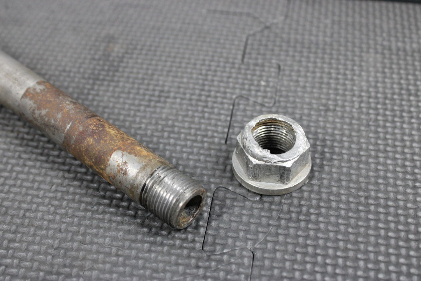 2000 KTM 250 EXC OEM REAR AXLE BACK WHEEL RIM PIVOT BOLT AXEL 77310085044 - hggarage