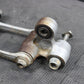 2009 HONDA CRF150RB CRF150R OEM REAR SHOCK LINKAGE LINKS ASSEMBLY