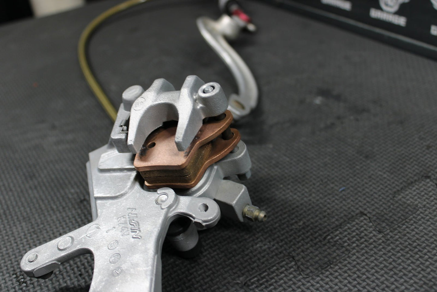 2009 HONDA CRF450R OEM NISSIN REAR BACK BRAKE CALIPER MASTER CYLINDER ASSEMBLY - hggarage