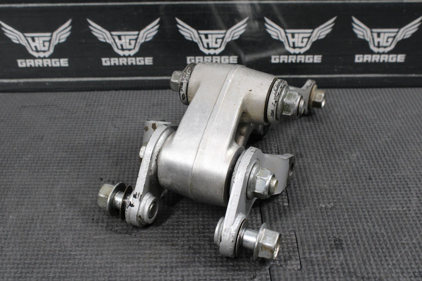 2014 KAWASAKI KX100 OEM REAR SHOCK LINKAGE RELAY ARM DOGBONE ASSEMBLY - hggarage