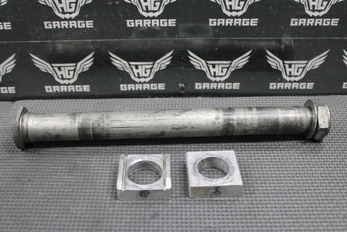 2006 HONDA CRF450X OEM REAR AXLE BACK WHEEL RIM PIVOT BOLT BLOCKS 42301 - KZ4 - J40 - hggarage
