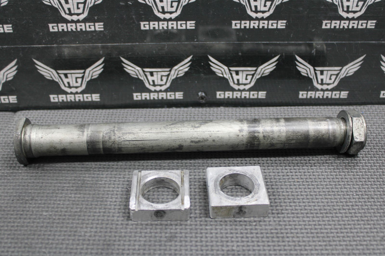 2006 HONDA CRF450X OEM REAR AXLE BACK WHEEL RIM PIVOT BOLT BLOCKS 42301 - KZ4 - J40 - hggarage