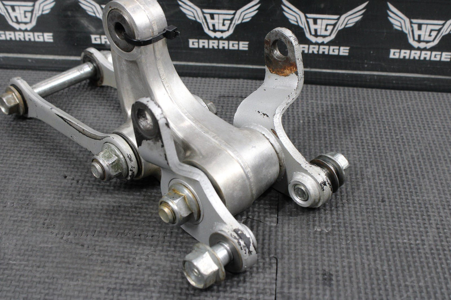 2014 KAWASAKI KX100 OEM REAR SHOCK LINKAGE RELAY ARM DOGBONE ASSEMBLY - hggarage