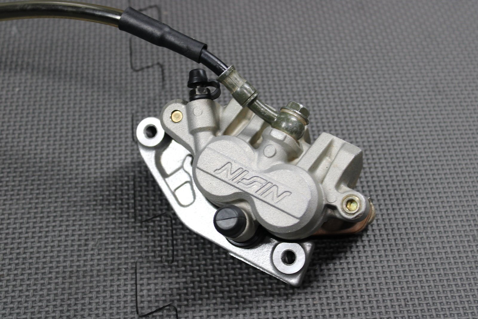 2006 Kawasaki KX450F OEM Nissin Front Brake Caliper Master Cylinder 43015 - 0167 - hggarage