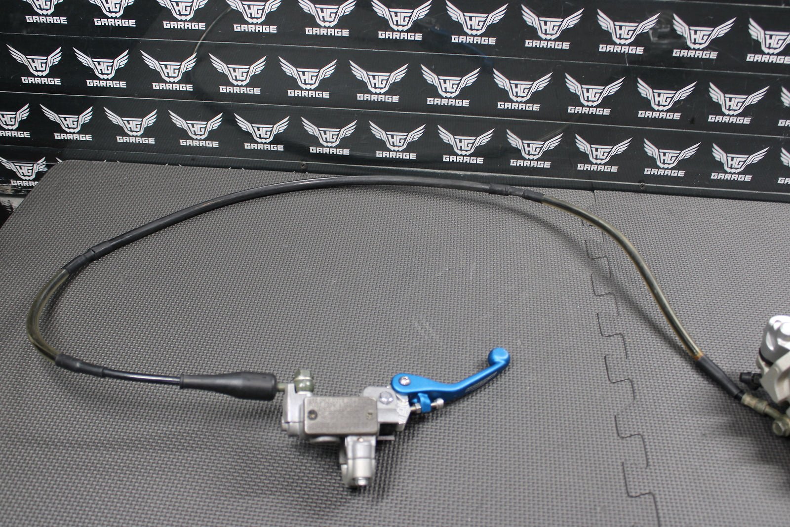 2006 Kawasaki KX450F OEM Nissin Front Brake Caliper Master Cylinder 43015 - 0167 - hggarage