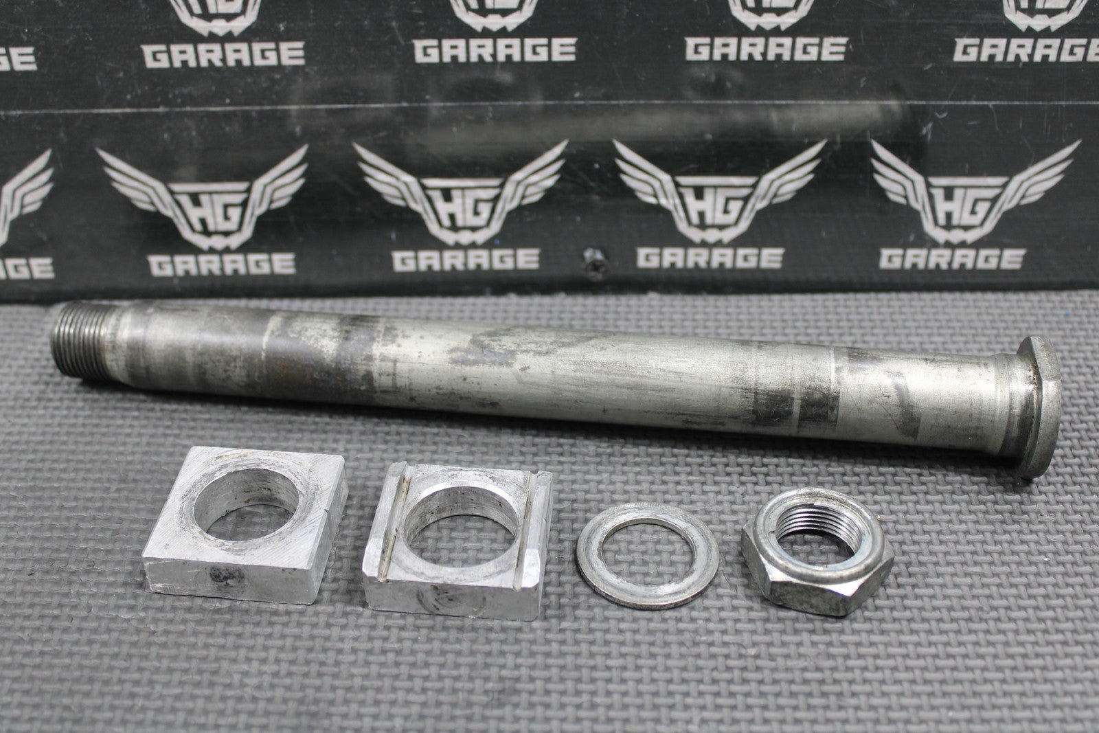 2006 HONDA CRF450X OEM REAR AXLE BACK WHEEL RIM PIVOT BOLT BLOCKS 42301 - KZ4 - J40 - hggarage
