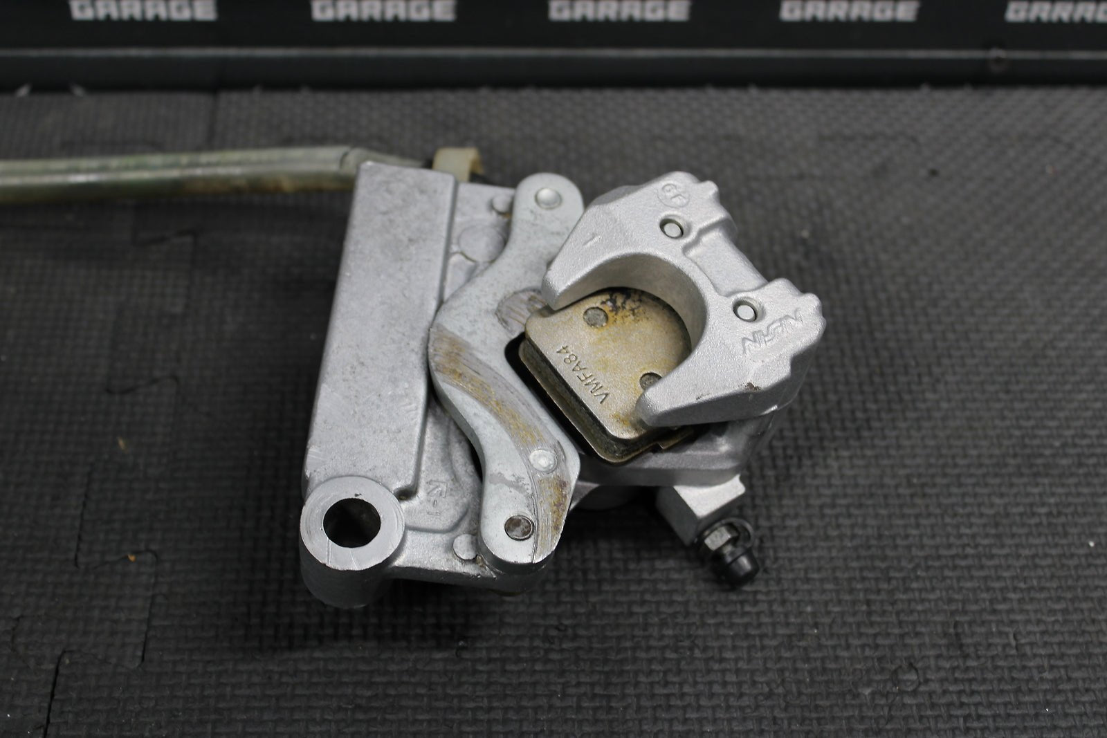 1995 KAWASAKI KX80 OEM NISSIN REAR BACK BRAKE CALIPER MASTER CYLINDER ASSEMBLY - hggarage