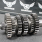 1986 KAWASAKI KDX200 OEM TRANSMISSION TRANNY GEARBOX SHIFT FORKS DRUM GEARS - hggarage