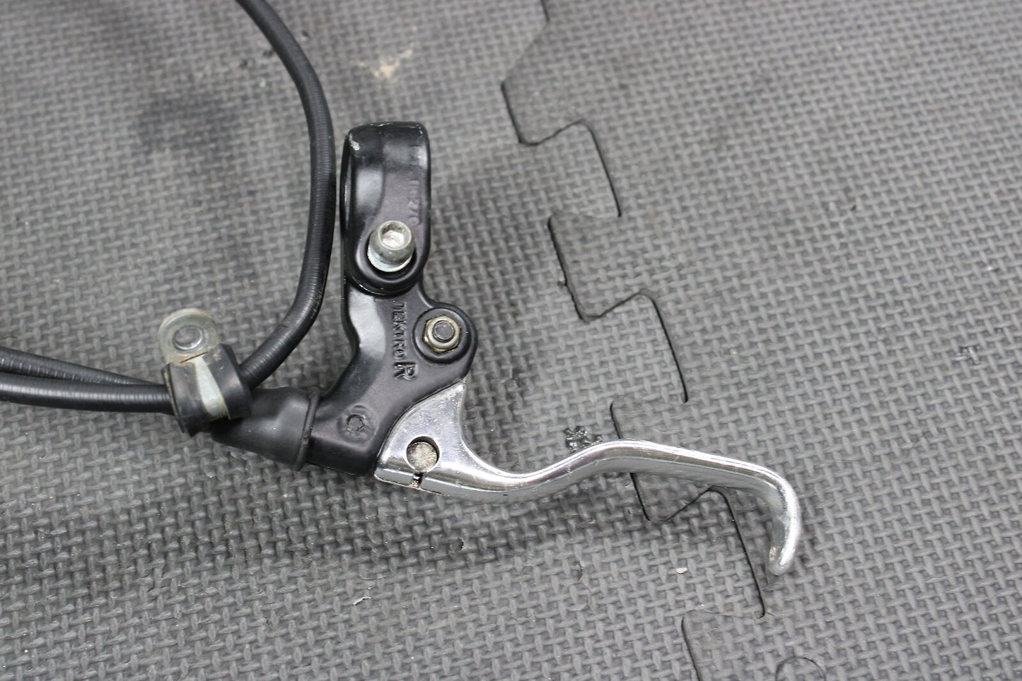 2000 KTM 50 OEM FRONT BRAKE DRUM CABLE LEVER ASSEMBLY 45009030000