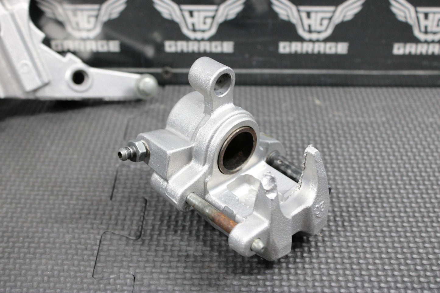 2014 KAWASAKI KX250F 04 - 18 OEM NISSIN REAR BACK BRAKE CALIPER HANGER 43080 - 0230 - hggarage